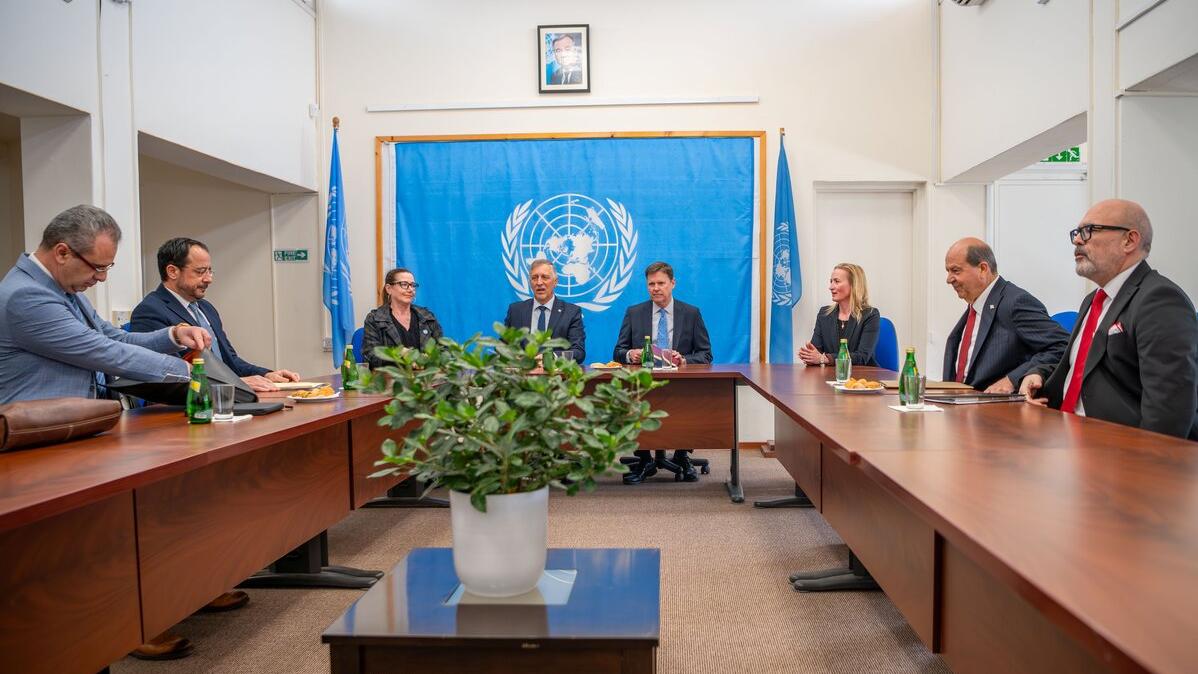 the Greek Cypriot leader, Mr. Nikos Christodoulides, and the Turkish Cypriot leader, Mr. Ersin Tatar